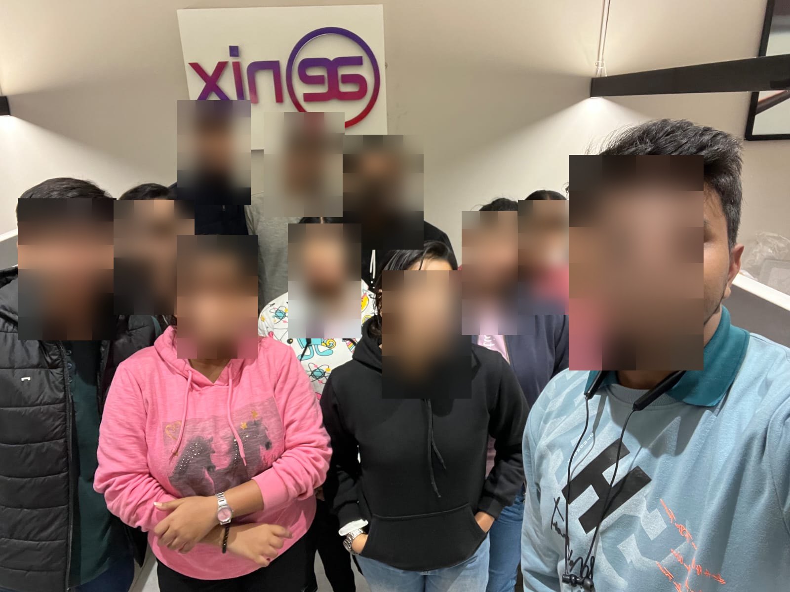 The MERN stack industrial training cohort photographed together at the end of the programme. All eleven faces have been masked in the published copy.